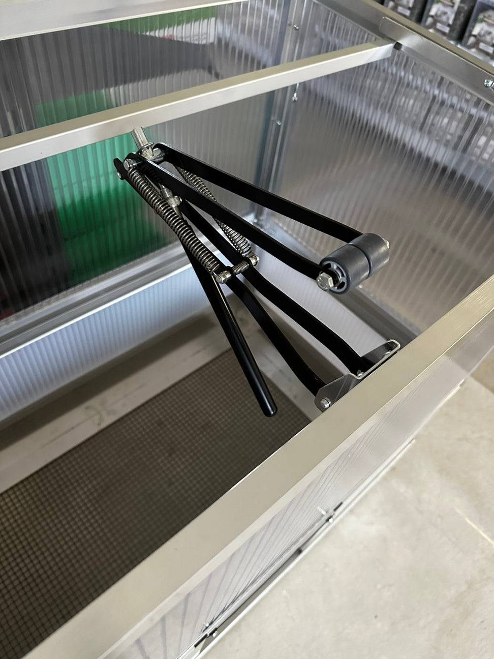 Automatischer Deckelheber mit Rolle und Spezialzylinder